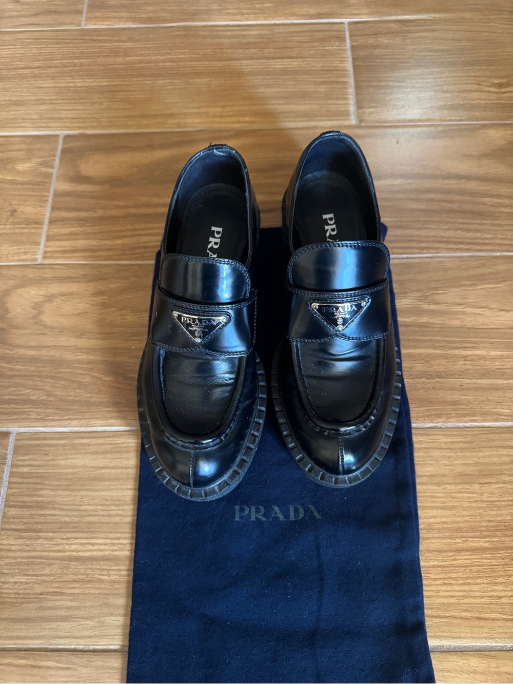 Prada Black Leather Penny Loafers with Triangular Logo
